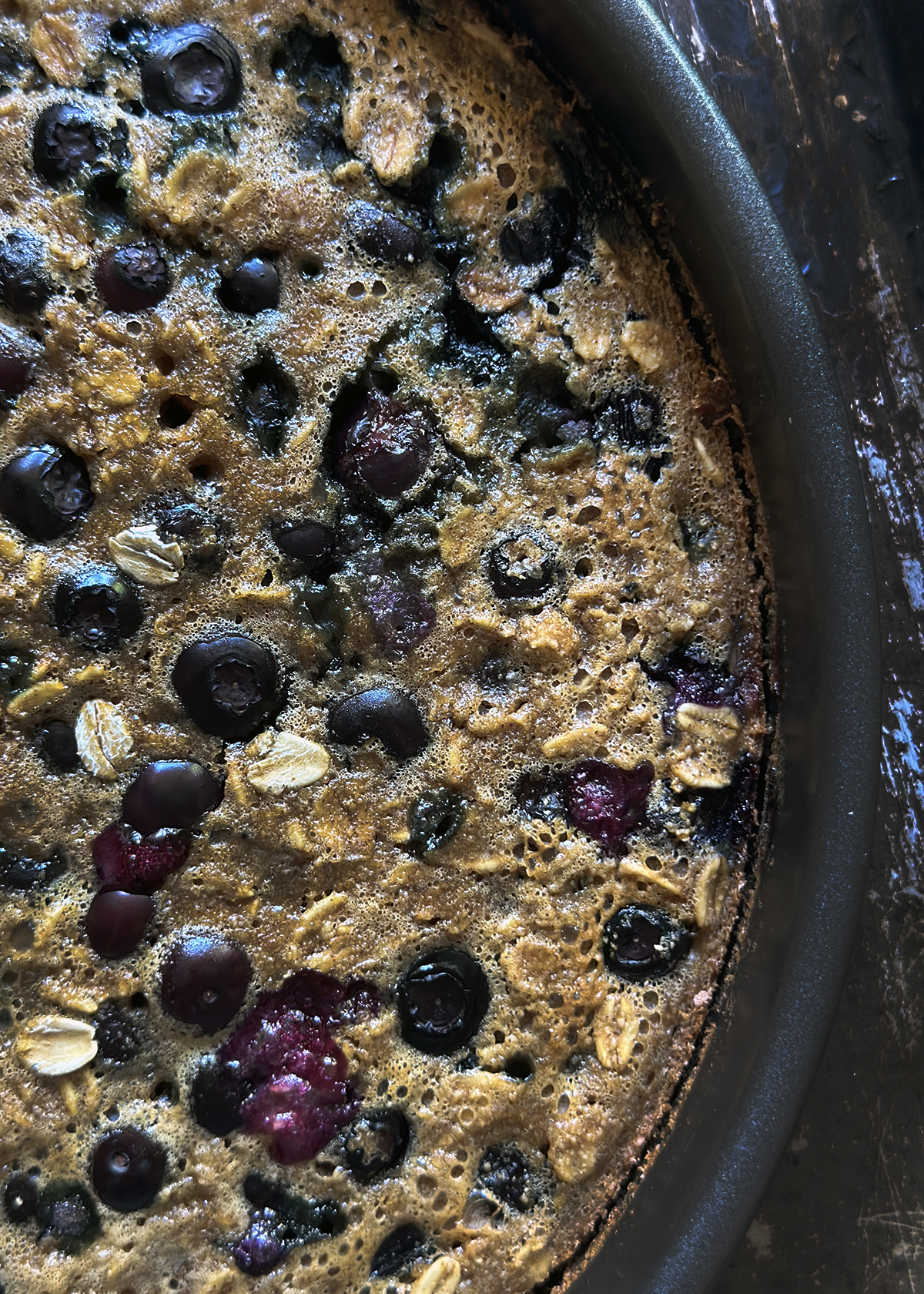 Blueberry Muffin Baked Oatmeal in pan, close-up