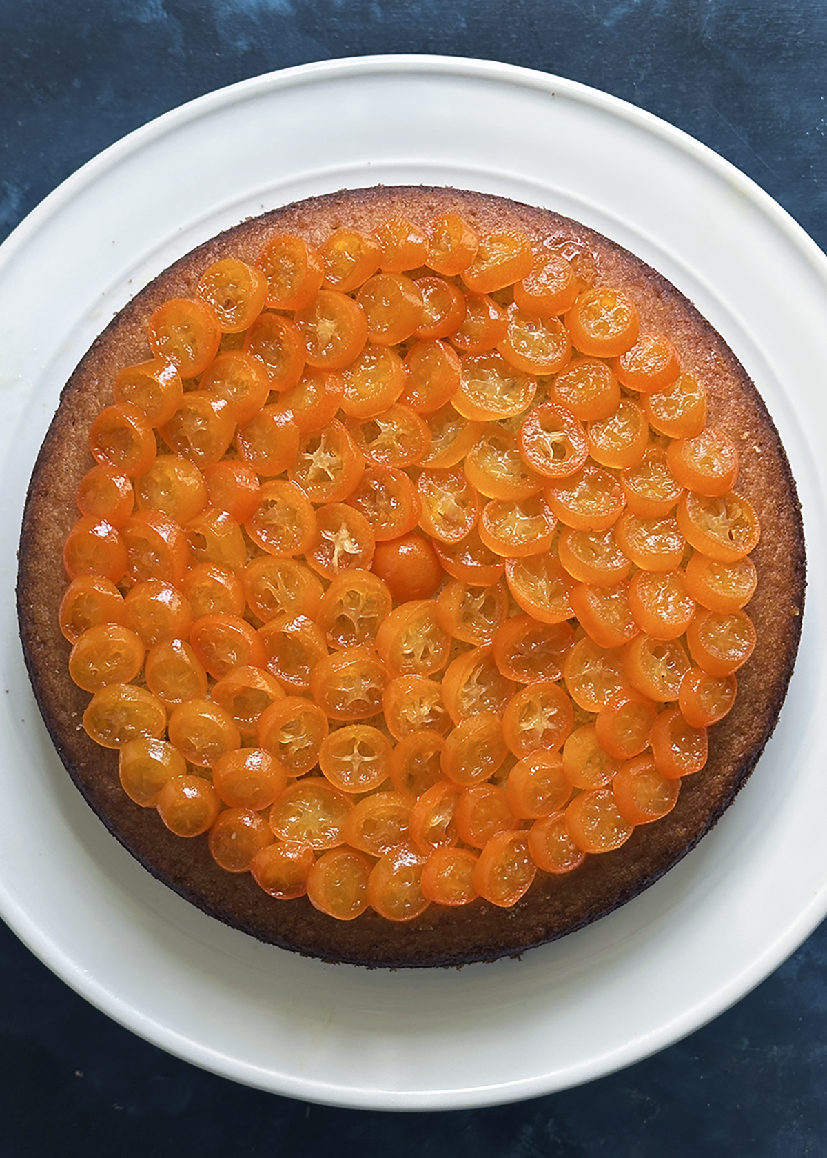 candied kumquats on cake
