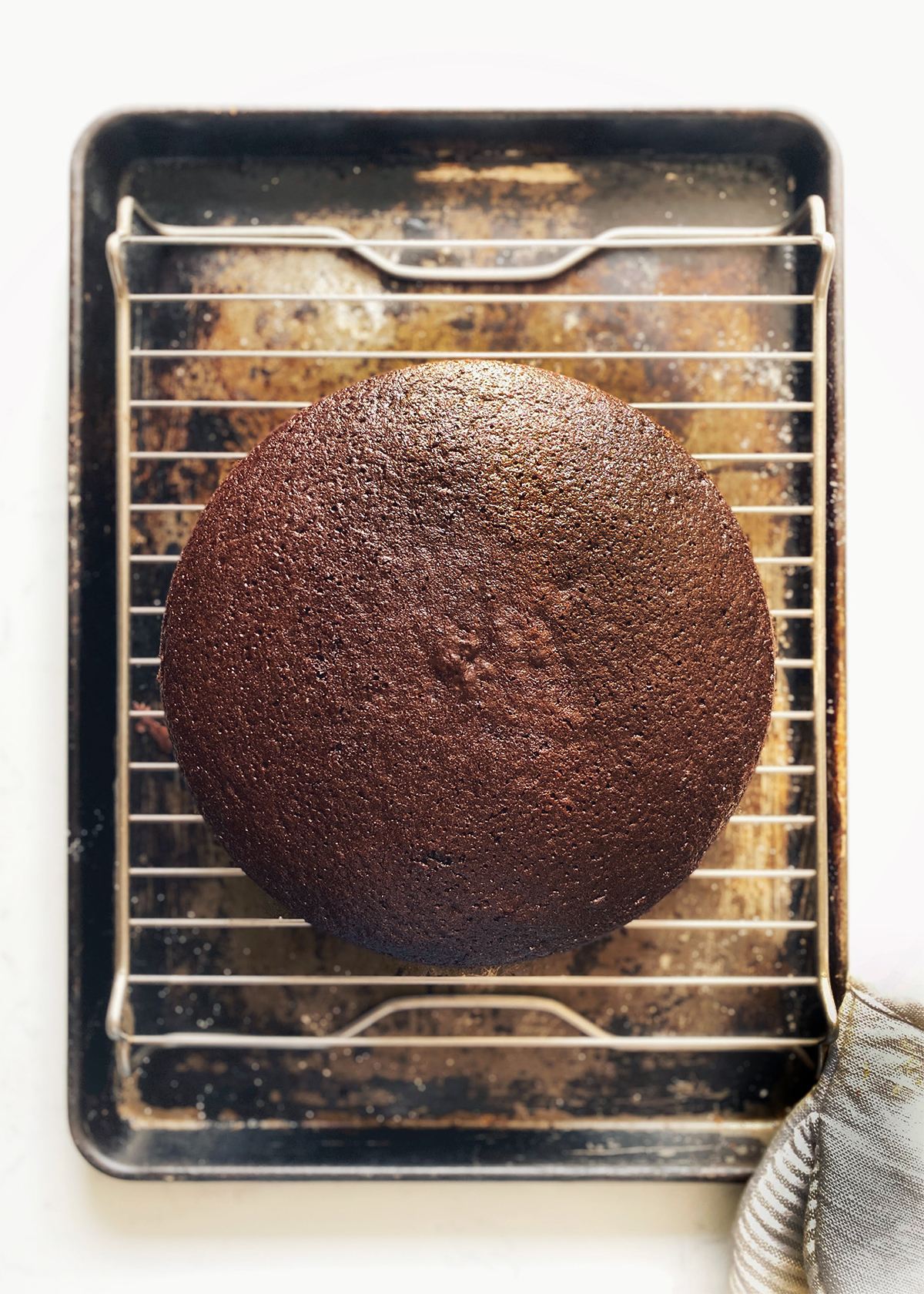 chocolate cake cooling on rack