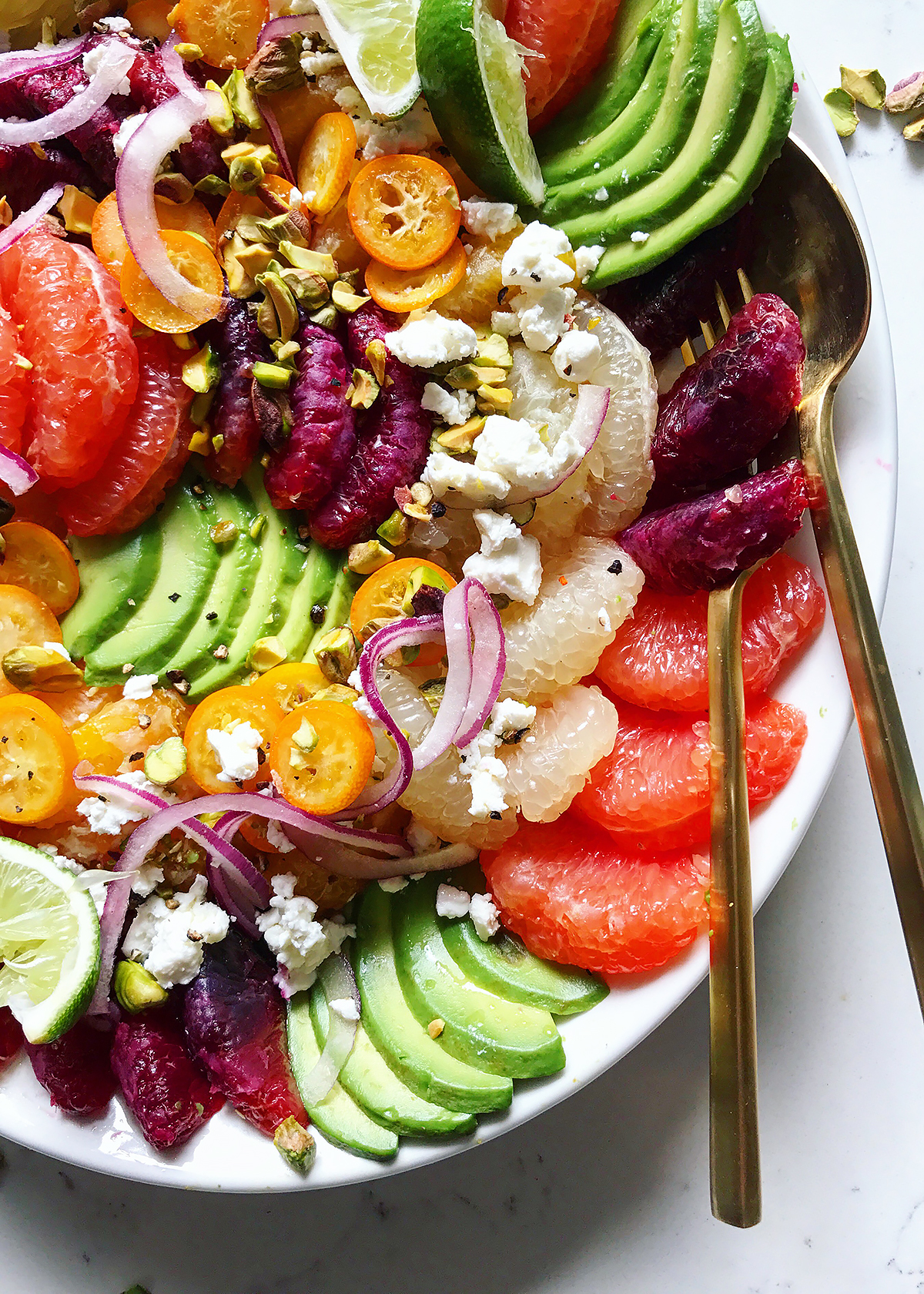 kumquats on citrus avocado salad