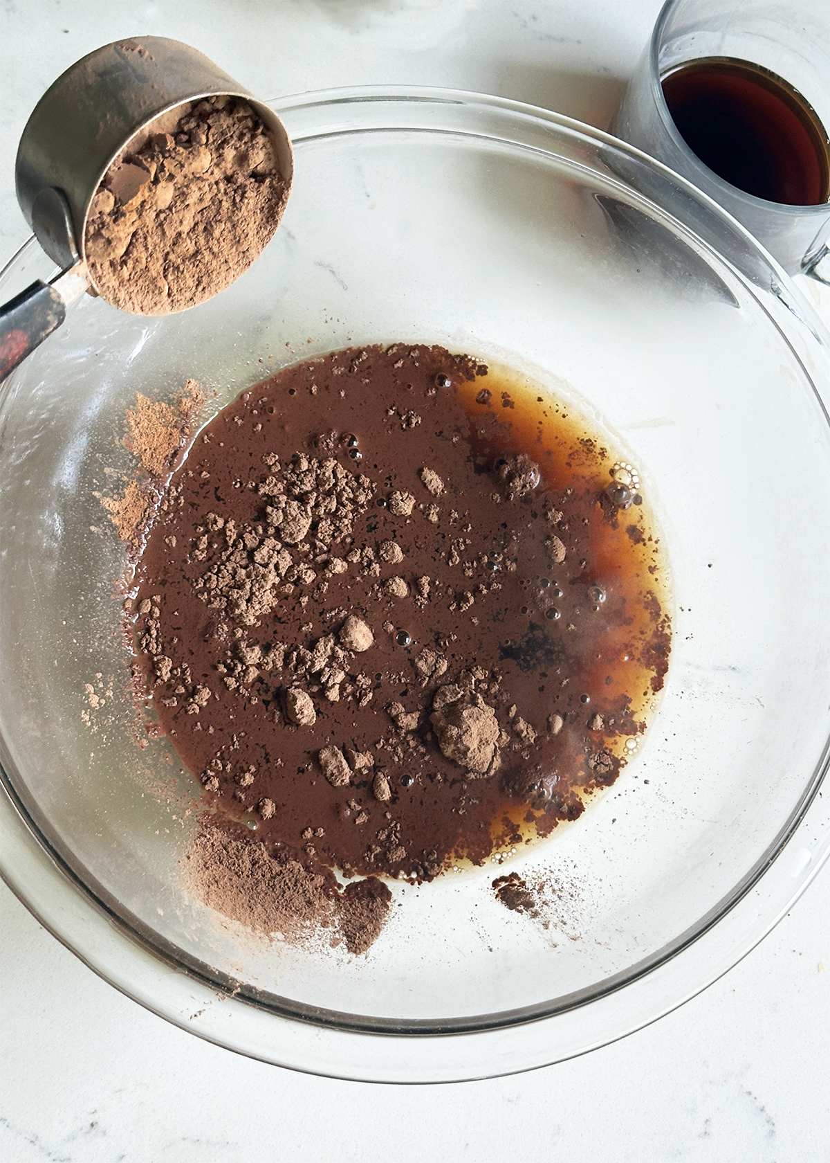 cocoa on coffee in mixing bowl