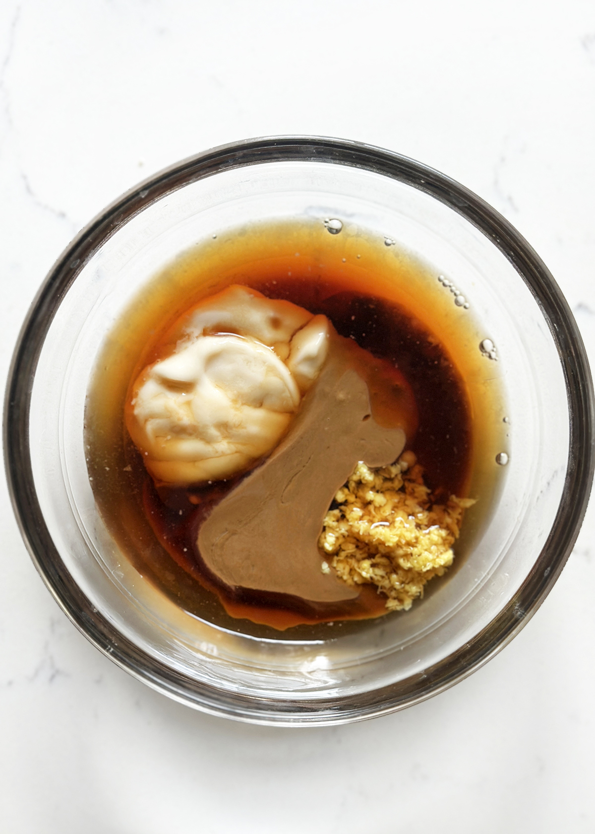 sesame dressing ingredients in bowl
