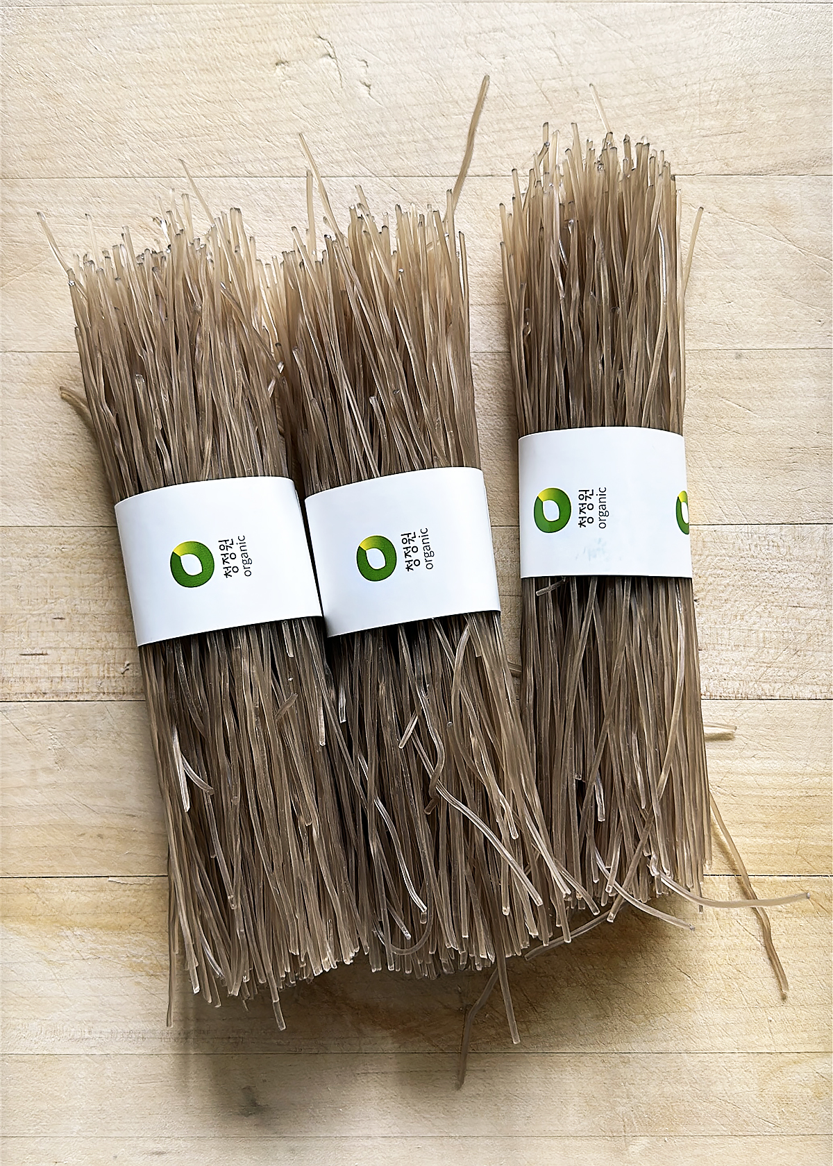 dried dang-myun noodles for japchae on wooden cutting board