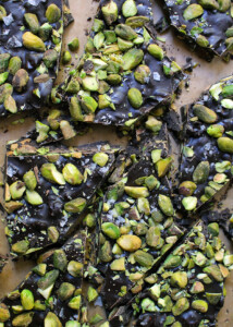 dark chocolate bark with pistachios sea salt on wooden board