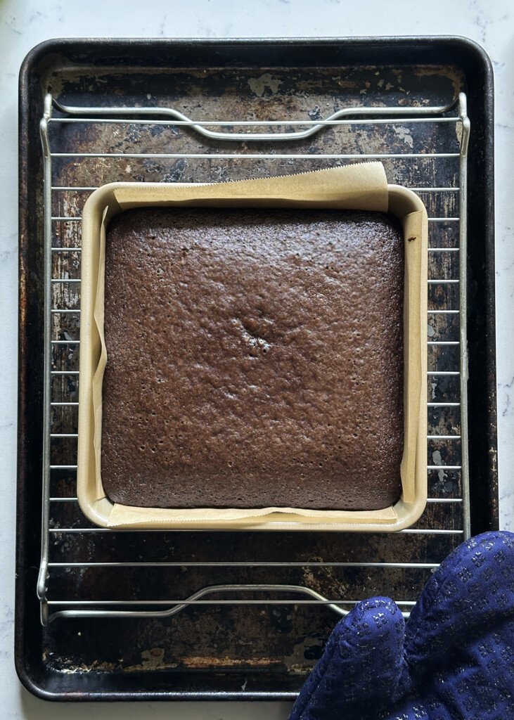 eggless chocolate cake cooling on rack