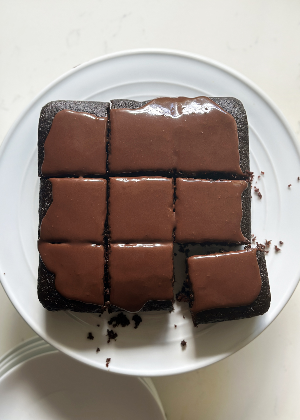 eggless chocolate cake, iced and cut