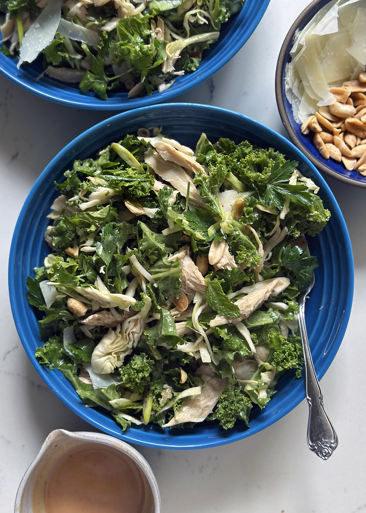 houstons kale salad in blue salad bowl