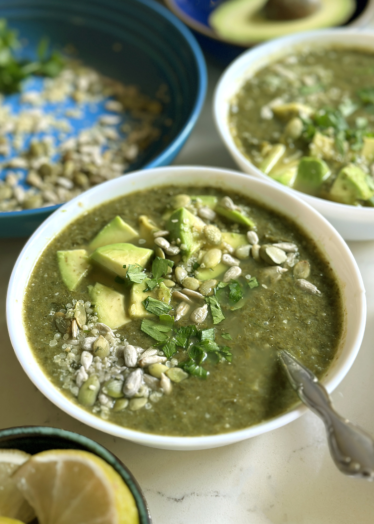 kale white bean soup in bowl with garnishes