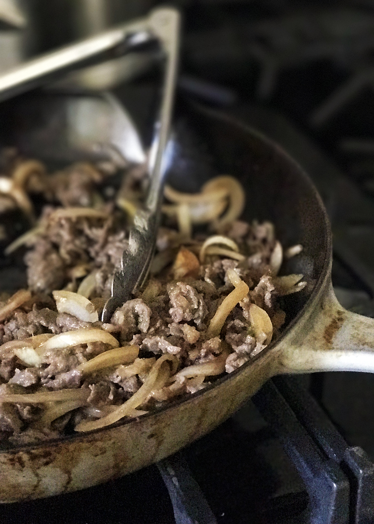 korean bbq beef bulgogi in cast iron skillet on stovetop
