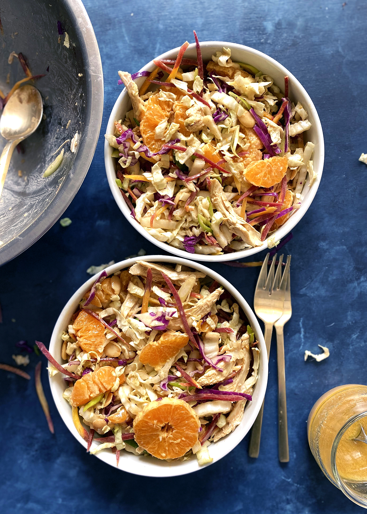 mandarin chicken salad, mixed and plated in bowls