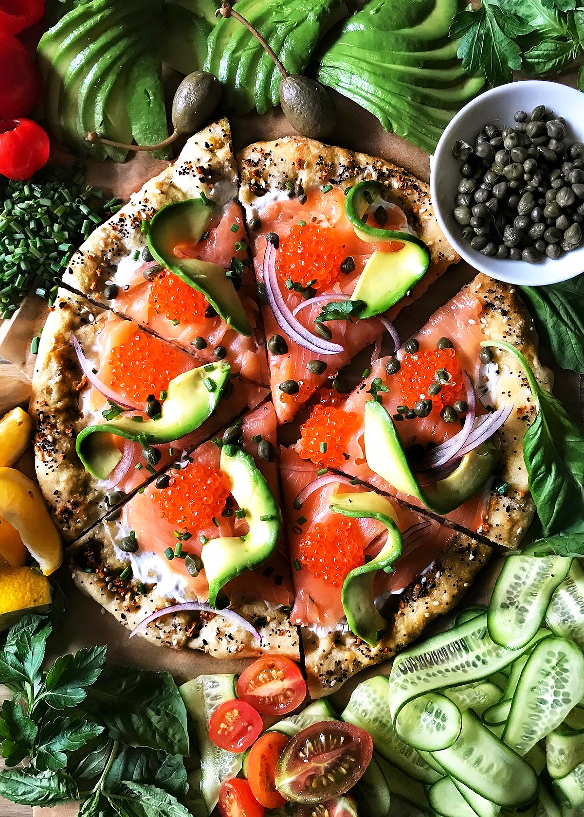 smoked salmon pizza with avocado and caviar