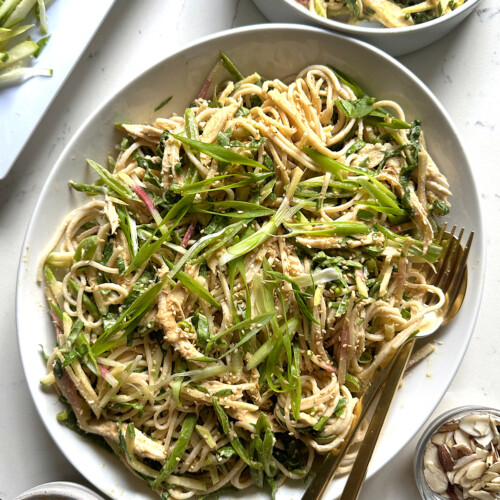soba noodle salad on oval platter