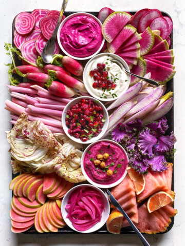 beet yogurt dip on winter pink and purple crudites platter