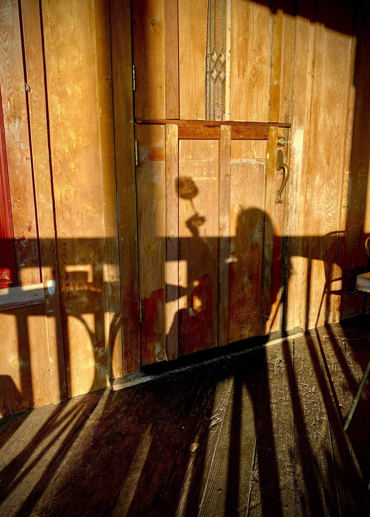 wine glass shadow on porch